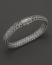 Intricately woven sterling silver from the John Hardy Chain collection. Intricately woven sterling silver from the John Hardy Chain collection.