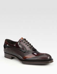 Leather lace-up style with 3D applique detail and exaggerated sole.Leather upperLeather liningLeather soleMade in Italy