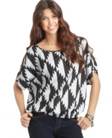 A graphic southwestern-inspired print gives Ali & Kris' top an on-trend look. So cute with colorful jeans!