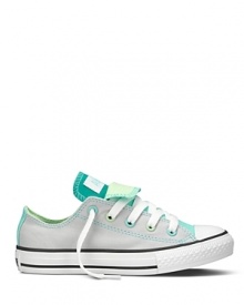 Double tongue Converse sneakers. A colorful canvas classic that transcends the ages. Double tongue Converse sneakers. A colorful canvas classic that transcends the ages.
