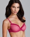 A sexy tonal stripe bra with lace trim and satin bow detail at front. Light padded with underwire for extra support. Adjustable straps that converts to a racerback. Hook/eye closure. Style #723803