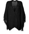 Finish your look on a dramatic note with Josephs black fringed mixed-knit alpaca poncho - Open front, fringed sides, contrast knit patterning throughout - Oversized, draped fit - Wear over form-fitting tops, figure-hugging trousers and sleek statement accessories