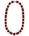 Paint the town red with this statement necklace from Nine West. Crafted from silver-tone mixed metal, the necklace features shapely stones for a stylish touch. Approximate length: 16 inches.