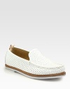 An instant upgrade to the casual slip-on style, handsomely crafted in perforated leather with contrast sole.Leather upperLeather liningPadded insoleRubber soleImported