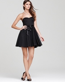 This revel-ready Aqua strapless dress touts a flirtatious skirt of metallic dots, finished with a ribbon belt for added polish. This revel-ready Aqua strapless dress touts a flirtatious skirt of metallic dots, finished with a ribbon belt for added polish.