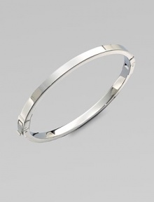 A sleek steel design with squared-off angles makes this piece perfectly versatile. SteelDiameter, about 2¼Hinged push clasp closureImported 