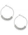 Put on the charm. Bar III's hoop earrings embrace crystal shimmer with charm accents. Crafted in silver tone mixed metal. Approximate diameter: 1-1/2 inches.