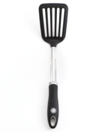 A model of comfort in your hand and indispensable for nearly every meal, this turner has a row of slots to drain away oil as you gracefully flip burgers and more. Limited lifetime warranty. A model of comfort in your hand and indispensable for nearly every meal, this turner has a row of slots to drain away oil as you gracefully flip burgers and more. Limited lifetime warranty.