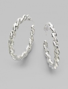 From the Glamazon Collection. A must-have hoop design in twisted sterling silver.Sterling silver Diameter, about 2 Post backs Imported 