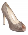 All that glitters is fabulous! Step into these glitter peep-toe pumps by Caparros and you'll be the belle of any ball.