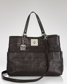 Join the block party. DKNY's tote in tonal leather is a luxe take on a daytime essential. This smooth and versatile style looks as chic with tailored frocks as with dark denim. Join the block party. DKNY's tote in tonal leather is a luxe take on a daytime essential. This smooth and versatile style looks as chic with tailored frocks as with dark denim.
