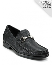 Crafted in soft pebbled leather, this handsome moc toe loafer is finished with the signature gancini logo bit at the tongue. Crafted in soft pebbled leather, this handsome moc toe loafer is finished with the signature gancini logo bit at the tongue.