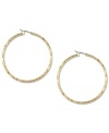 Hints of subtle texture create a look that's modern and elegant on these Jones New York hoop earrings. Crafted in gold tone mixed metal. Approximate drop: 3/4 inch.