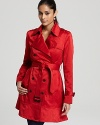 Embrace the season's color crush with this hot-hued Marc New York trench boasting classic detailing along with a flared hem for a feminine finish.