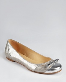 Shimmer away in kate spade new york's Holland ballet, crafted in subtly sparkling leather and accented with dainty cutouts. Shimmer away in kate spade new york's Holland ballet, crafted in subtly sparkling leather and accented with dainty cutouts.