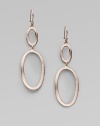 From the Lite Links Collection. Simple yet striking, these subtly undulating oval link earrings of sterling silver and 18k gold are finished in glowing 18k rose goldplating.18k gold and sterling silver with rose goldplating Drop, about 3¼ Ear wire Made in USA
