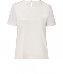 Elegant top made ​.​.of fine ivory viscose blend - Feminine, slim silhouette and soft, flattering case - Round neck and short sleeves - Wonderfully simple design is elegant and sophisticated - Favorite top for smart and stylish occasions when paired with suit pants, pleated skirts or leather pants