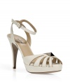 Channel refined style in these ultra-luxe leather sandals from Valentino - Cut-out detailed front with silver-tone stud, front platform and high heel, ankle strap closure - Style with a flirty floral dress for off-duty glam or a fitted pencil skirt for workweek chic