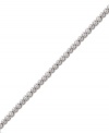 Add sheer elegance to your ensemble with a simple, sparkling bracelet. Swarovski's tennis-style bracelet features bezel-set round-cut crystals in silver tone mixed metal. Approximate length: 7 inches.