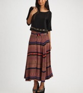 This season's must-have midi silhouette, interpreted in boldly-striped silk.High waist, belted Belt at lower waist Dropped yoke Button front Pullover style About 37 long Silk Dry clean ImportedOUR FIT MODEL RECOMMENDS ordering true size. 