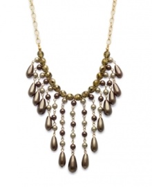 Charter Club's stunning Drama Bib necklace is sure to steal the show whenever you wear it! Crafted with an array of beads and stones in gold-tone mixed metal. Approximate length: 12 inches + 2-inch extender. Approximate drop: 6 inches.