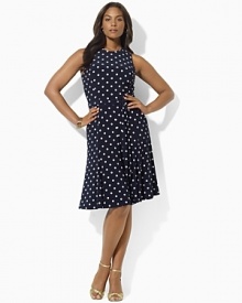 Finished with a flared hem and a self-tie belt at the waist, this dress is rendered from smooth matte jersey and exudes a flirty, feminine feel.