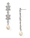 Say I do to sparkle. With a floral design and dangly shape, Carolee's linear earrings vow to wow.