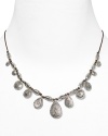 Lauren Ralph Lauren pays homage to Southwestern style with this drop necklace, accented by an evocative mix of natural cord and textured silver-plated beads.