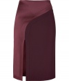 This striking mixed media pencil skirt from fashion-forward London brand Hakaan features a sumptuous satin panel and a flattering figure-hugging silhouette - High waist, satin asymmetric panel, curved seam, front slit, pencil silhouette, concealed back zip closure - Pair with an edgy silk blouse and sky-high platforms