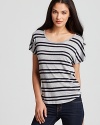 Turn around in this Vintage Havana striped tee to reveal an eye-popping neon-trimmed zipper.