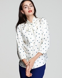 A scribbled dot print gives a modern touch to Shoshanna's luxe silk tie-neck blouse. A scribbled dot print gives a modern touch to Shoshanna's luxe silk tie-neck blouse.