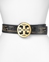 Tap this season's texture trend with Tory Burch's leather and raffia belt -- a signature logo buckle makes this on-trend piece statement making.