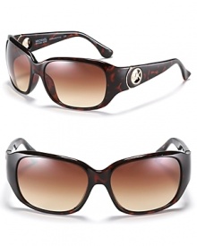 Anything but subtle, these square-ish sunglasses are summer-ready. From MICHAEL Michael Kors with cutout logo detail on temples. Nose tab help secure fit. Anything but subtle, these square-ish sunglasses are summer-ready. From MICHAEL Michael Kors with cutout logo detail on temples. Nose tab help secure fit.