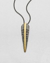 Sparkling white sapphires set in radiant 23k goldplating on a sterling silver feather base with a link chain. White sapphires23k goldplated sterling silverSterling silverLength, about 16 to 18 adjustablePendant size, about 1.44Lobster clasp closureImported