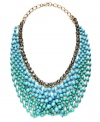 Crazy for colorblocking. Snap up this latest trend and wear it well with INC International Concepts statement-making style. Turquoise and teal-colored plastic beads and sparkling glass accents mix for an ultra-chic look. Crafted in gold-plated mixed metal. Approximate length: 20 inches. Approximate drop: 4 inches.