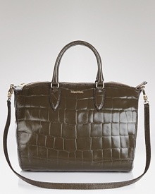 Max Mara's structured stamped leather tote is an investment in timeless style and classic design. Max Mara's structured stamped leather tote is an investment in timeless style and classic design.