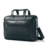 Smart pebble grain leather breezes through airline terminals with a checkpoint-friendly construction featuring a protective sleeve, front organizer and quick access pocket for hassle-free travel. 3-year warranty.