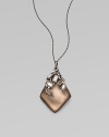 An elegant, handcrafted design in an unique shape, accented with a cascade of sparkling Swarovski crystals. LuciteSwarvoski crystalsRutheniumLength, about 16 to 19 adjustablePendant size, about 2Lobster clasp closureMade in USA