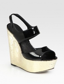 Sky-high self-covered wedge with a glossy patent leather upper and stretchy slingback strap. Self-covered wedge, 5½ (140mm)Covered platform, 2 (50mm)Compares to a 3½ heel (90mm)Patent leather upperLeather lining and solePadded insoleImported