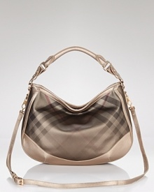 Soft leather trims Burberry's preppy check for a chic, durable classic that pairs with anything (and everything). Soft leather trims Burberry's preppy check for a chic, durable classic that pairs with anything (and everything).