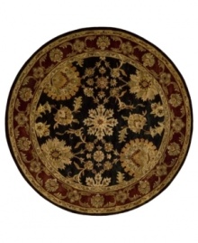 Rich with color and refined floral motifs, this Nourison area rug offers luxury for any space. Soft, durable wool is tufted by hand and herbal-washed for a beautiful, heirloom-quality texture and sheen.