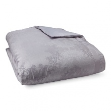 An enchanting, traditional pattern woven in cotton and silk evokes a sense of glamour in shades of lilac and silver. Duvet and shams reverse to solid cotton. An enchanting, traditional pattern woven in cotton and silk evokes a sense of glamour in shades of lilac and silver. Duvet and shams reverse to solid cotton.