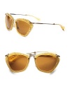 An unique and retro acetate design with a fun pentagon shape, thin metal bridge and temples. Available in red glitter with brown lens, black with grey lens, gold glitter with brown lens, silver glitter with grey lens.Logo temples100% UV protectionMade in Italy 