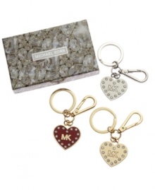 Show your love with a great gift: an MK keychain featuring a heart charm studded with pave stones. Comes in a bejeweled case. Show your love with a great gift: an MK keychain featuring a heart charm studded with pave stones. Comes in a bejeweled case.