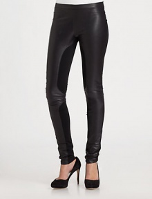 Wear now and love forever-- these lustrous leather leggings have modern contrast panels and a secure elastic waistband. Elastic waistbandRise, about 7Inseam, about 33Body: Lamb leather; Contrast: 85% polyester/15% spandexDry cleanImported of Italian fabricModel shown is 5'10 (177cm) wearing US size 2.