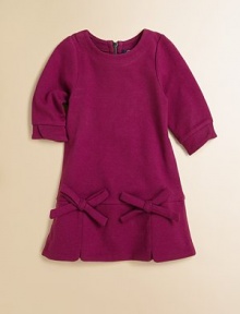 A darling drop-waist silhouette accented with two charming bows in front and an edgy-chic exposed zipper.CrewneckExposed back zip closureFour-panel skirt71% polyester/27% viscose/2% elastaneMachine washImported A darling drop-waist silhouette accented with two charming bows in front and an edgy-chic exposed zipper.CrewneckExposed back zip closureFour-panel skirt71% polyester/27% viscose/2% elastaneMachine washImported