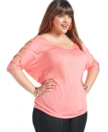 Take your look to the edge with Soprano's elbow sleeve plus size top, showcasing sexy cutouts.