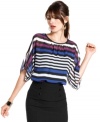 Know your lines: a pretty assembly of multicolor stripes add pop power to this sheer, lightweight top from BCX.