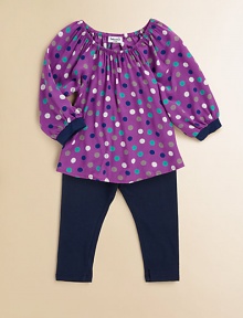 A mod-inspired, colorful polka dot print adorns a gathered tunic and paired with matching leggings for a charming set. Tunic Gathered elasticized round necklineLong puff sleevesPullover style Leggings Elastic waistband47% pima cotton/47% modal/6% spandexLeggings: RayonMachine washImported