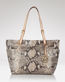 Give your look a luxe, exotic finish with this python-embossed leather tote from the master of chic: MICHAEL Michael Kors. Give your look a luxe, exotic finish with this python-embossed leather tote from the master of chic: MICHAEL Michael Kors.
